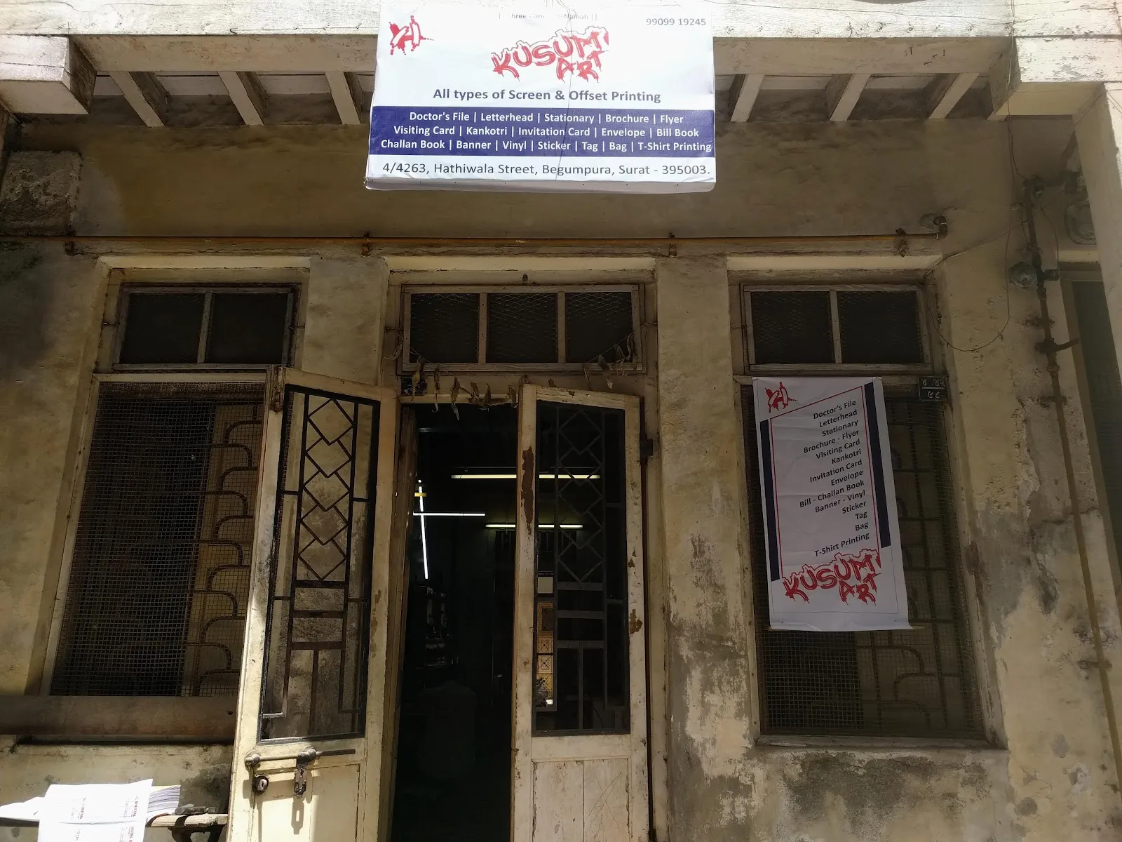 Kusum Art shop front on Hathiwala Street, Begumpura, Surat
